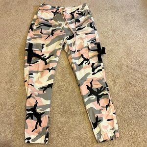 Cargo pants, pink black white and gray design.